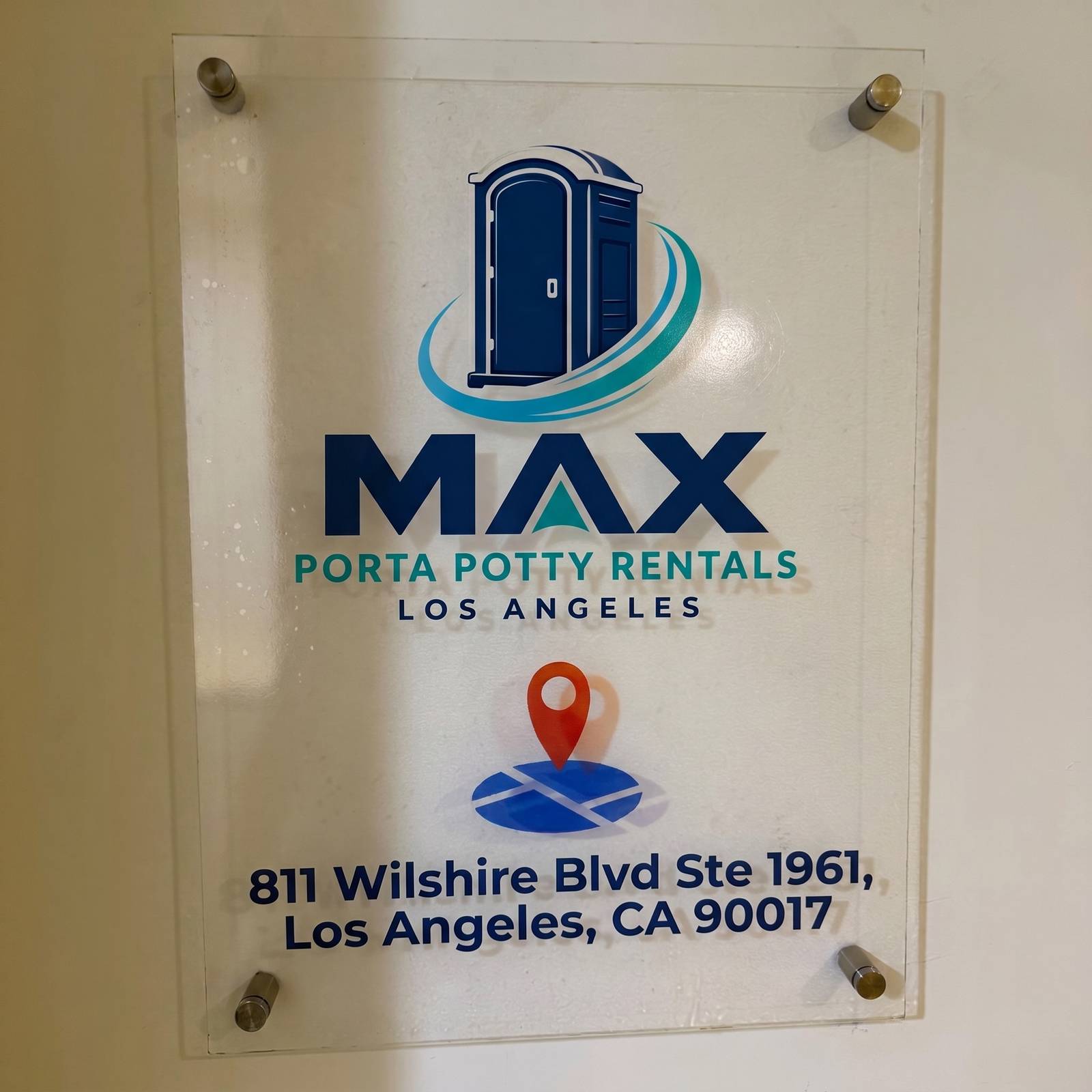 Office plaque featuring the brand mark